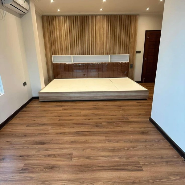 Premium SPC flooring Dubai installed in a luxury bedroom