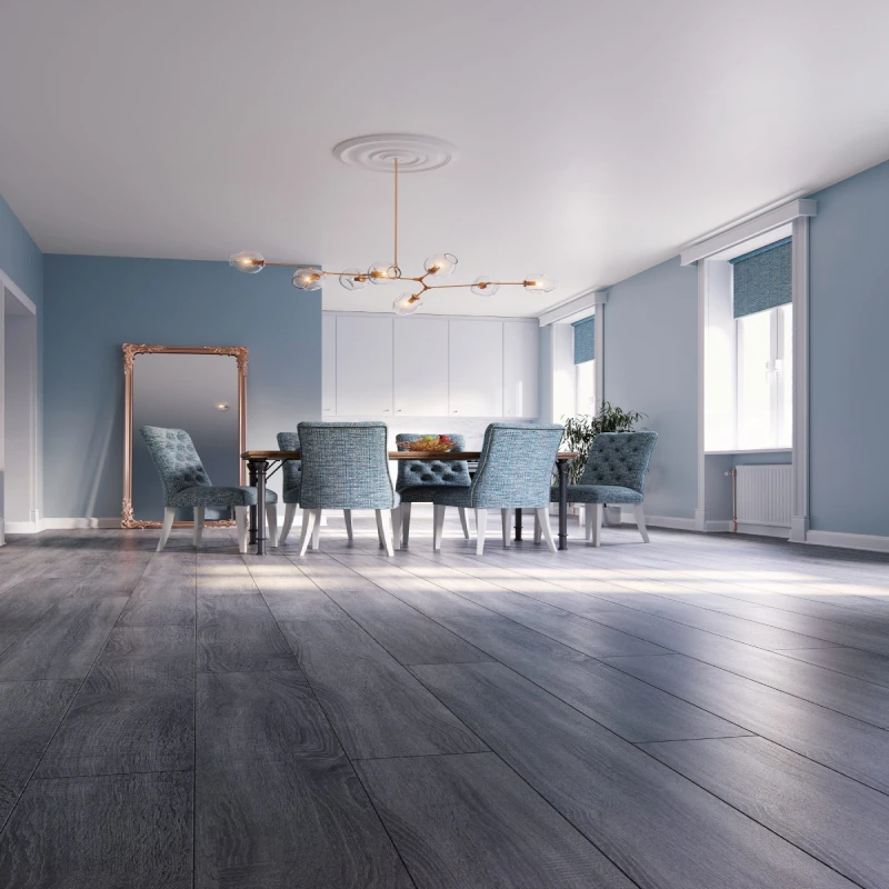 dark grey wood-textured lvt flooring with blue upholstered chairs and a contemporary gold chandelier